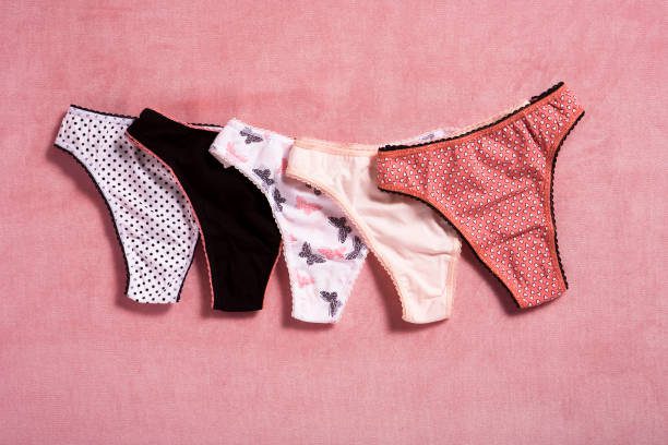 Japanese Tucking Method 2 Panties Isolated On Pink Background Underwear Stock Pictures, Royalty-Free Photos &Amp; Images