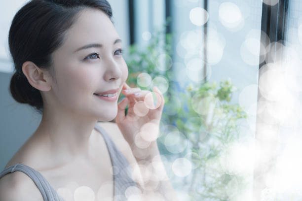 Beauty Concept Of A Young Asian Woman. Skin Care. Body Care. Cosmetics.  Hair Removal Cream Stock Pictures, Royalty-Free Photos &Amp; Images